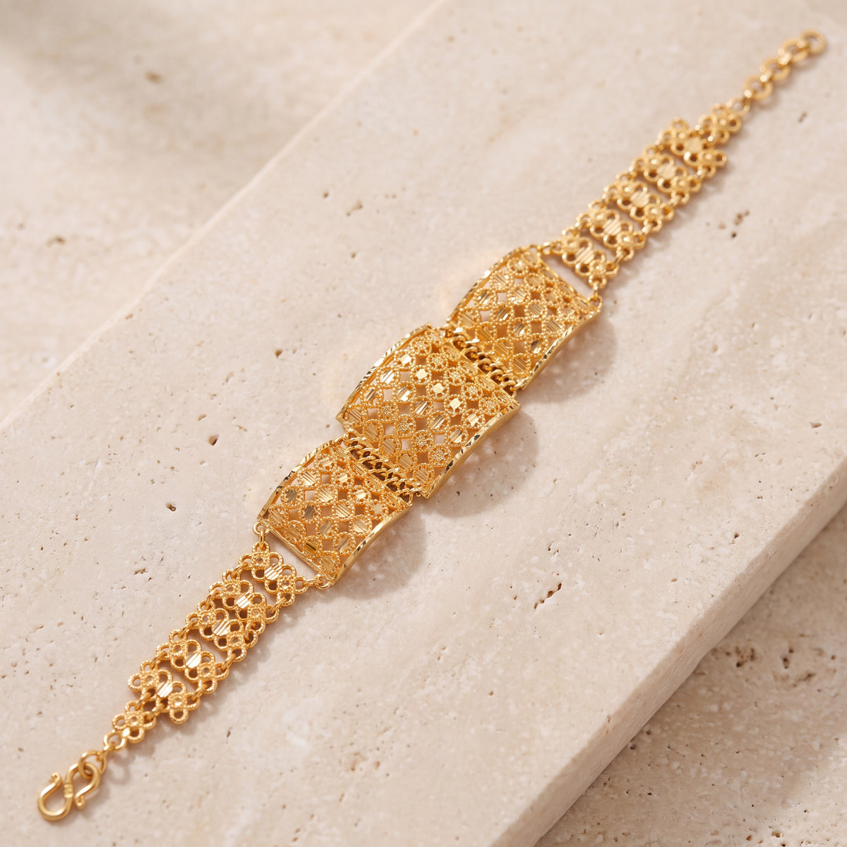Square Design Bracelet (D1) on travertine
