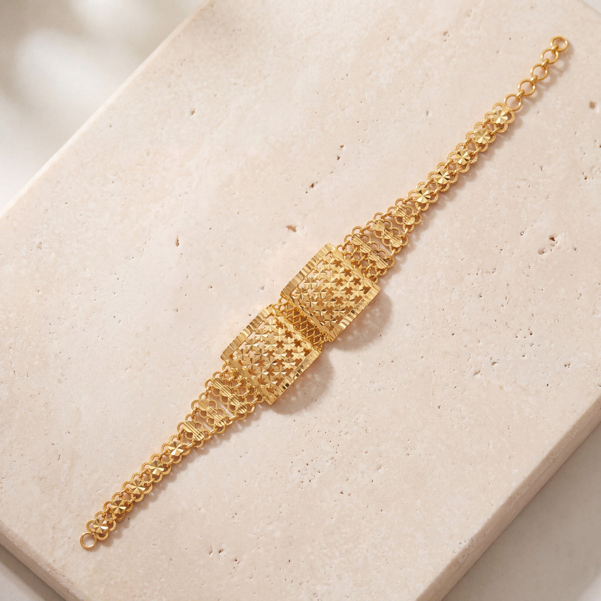 Square Design Bracelet (D3) on travertine
