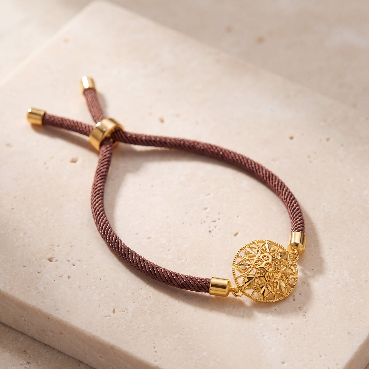 Star Thread Bracelet on travertine