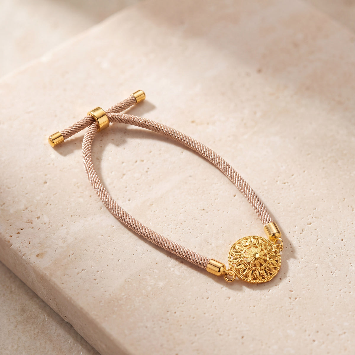 Sun Thread Bracelet on travertine