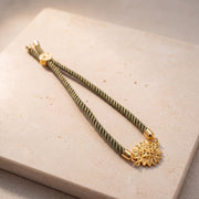 Sunflower Thread Bracelet on travertine
