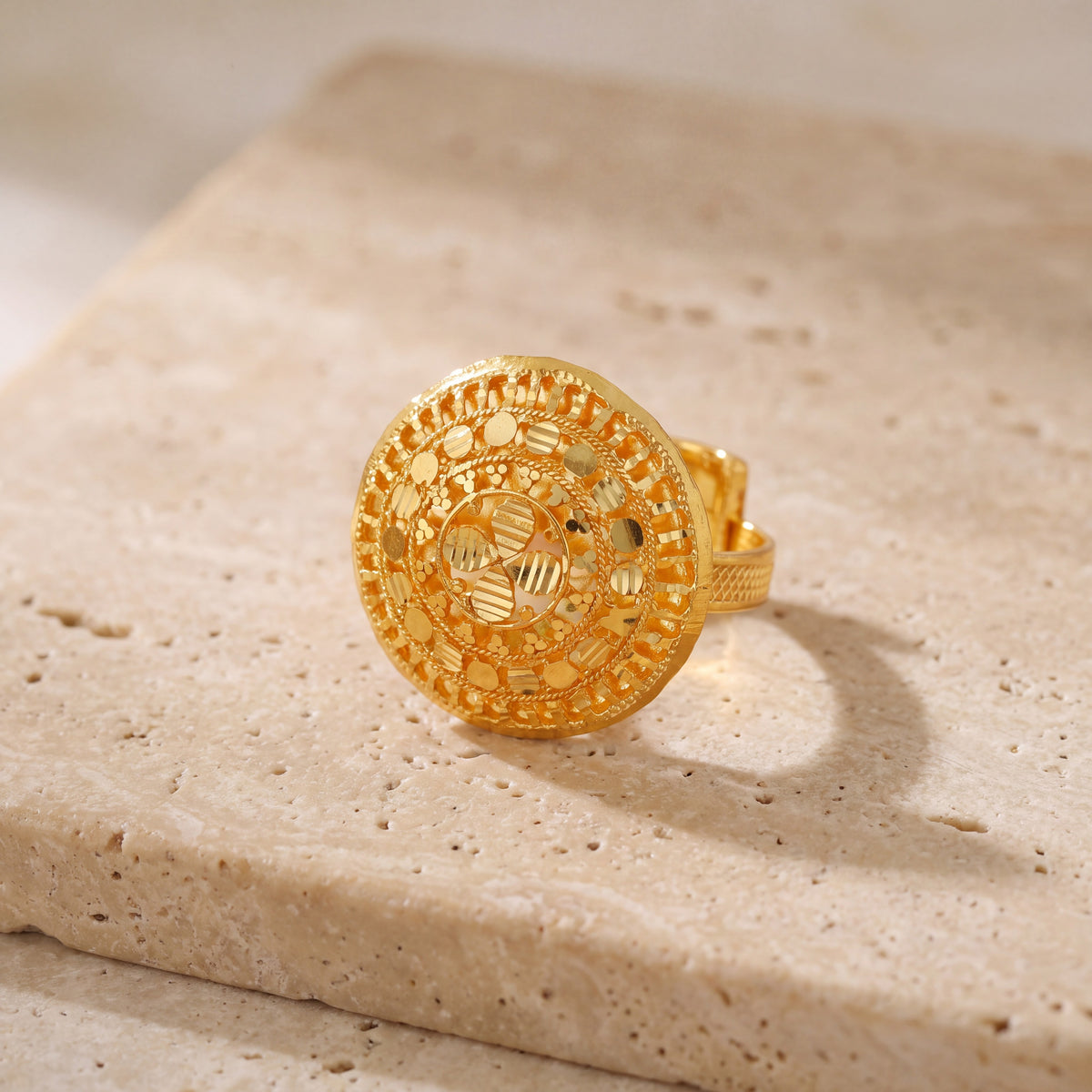 Traditional Ring (135) on travertine