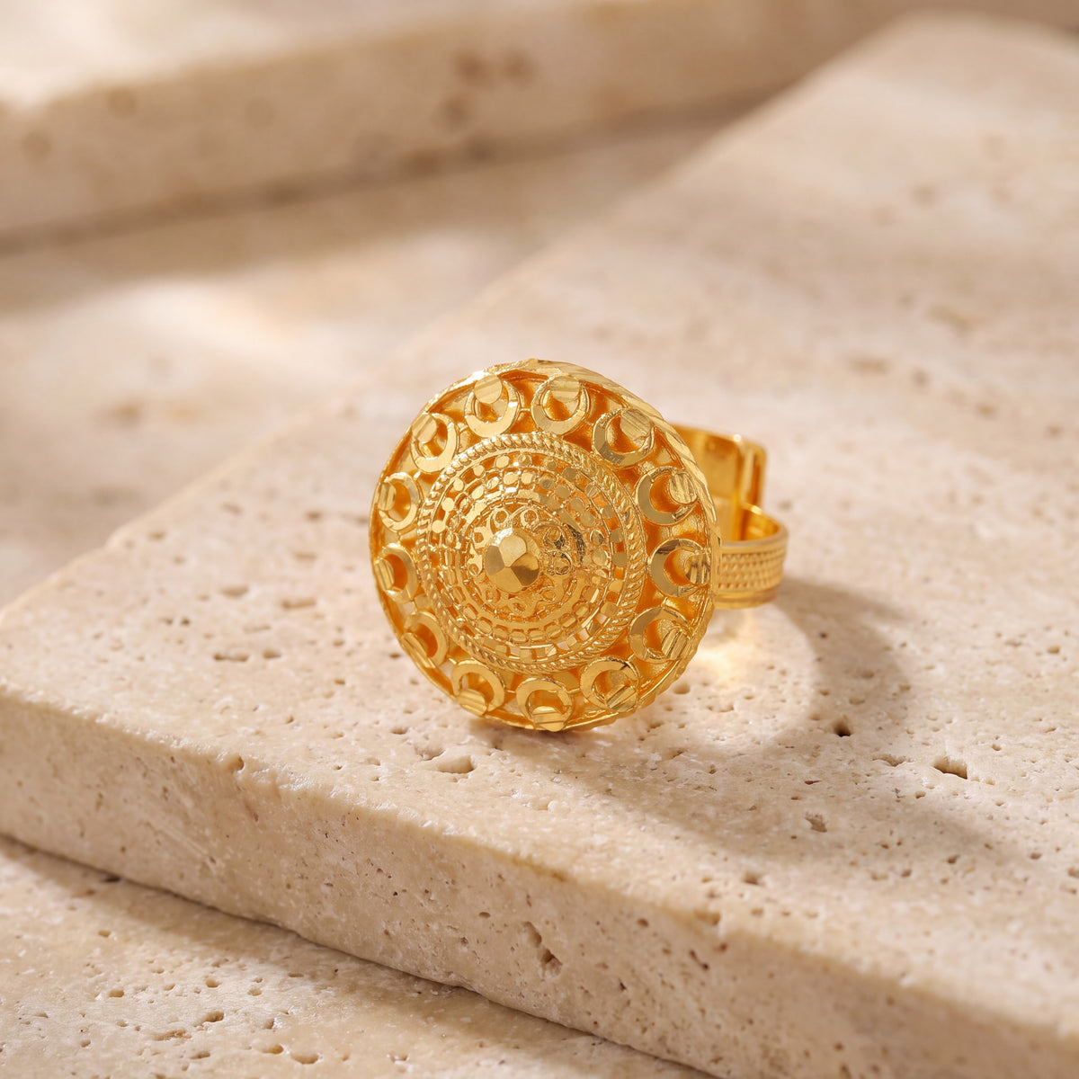 Traditional Ring (148) on travertine