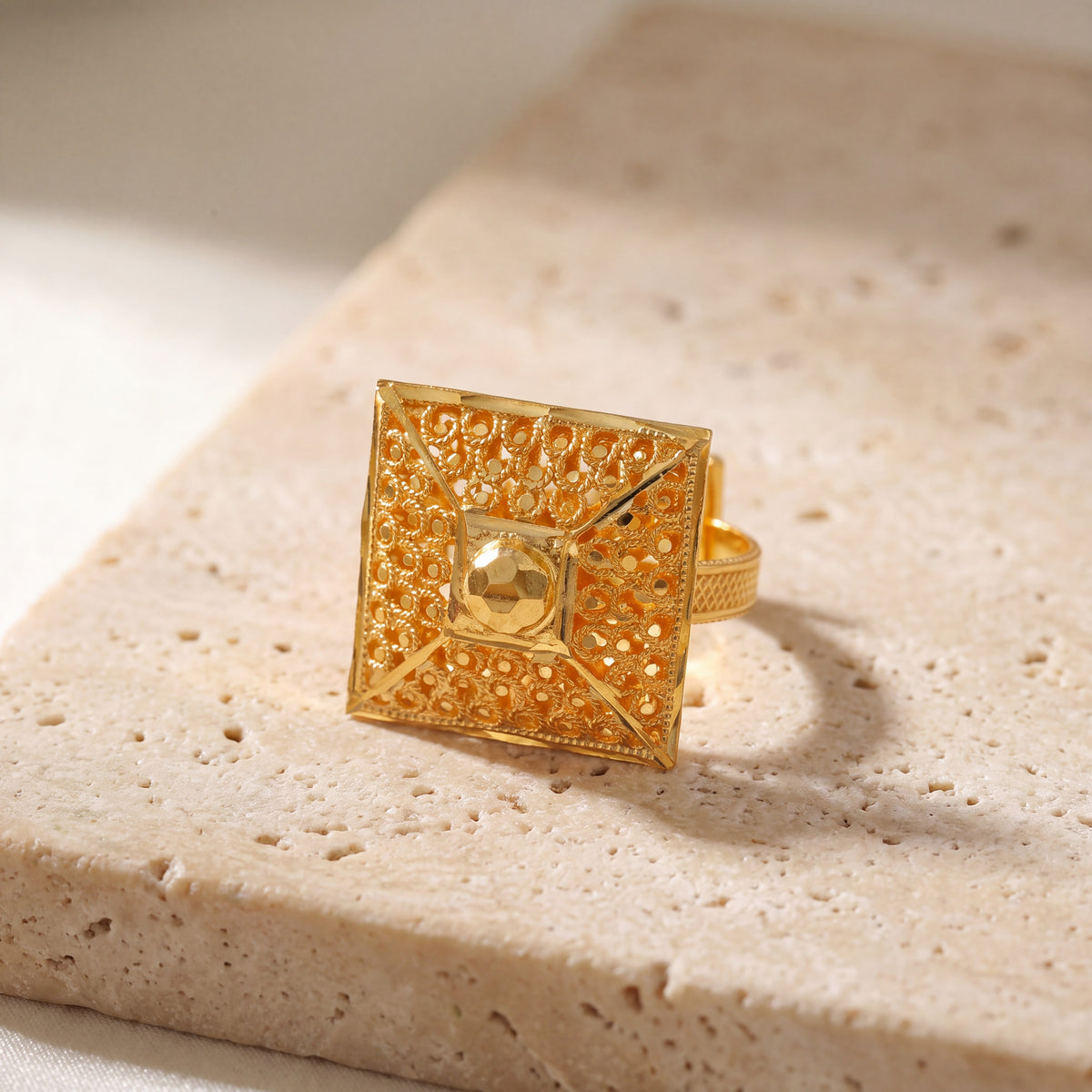 Traditional Ring (153) on travertine