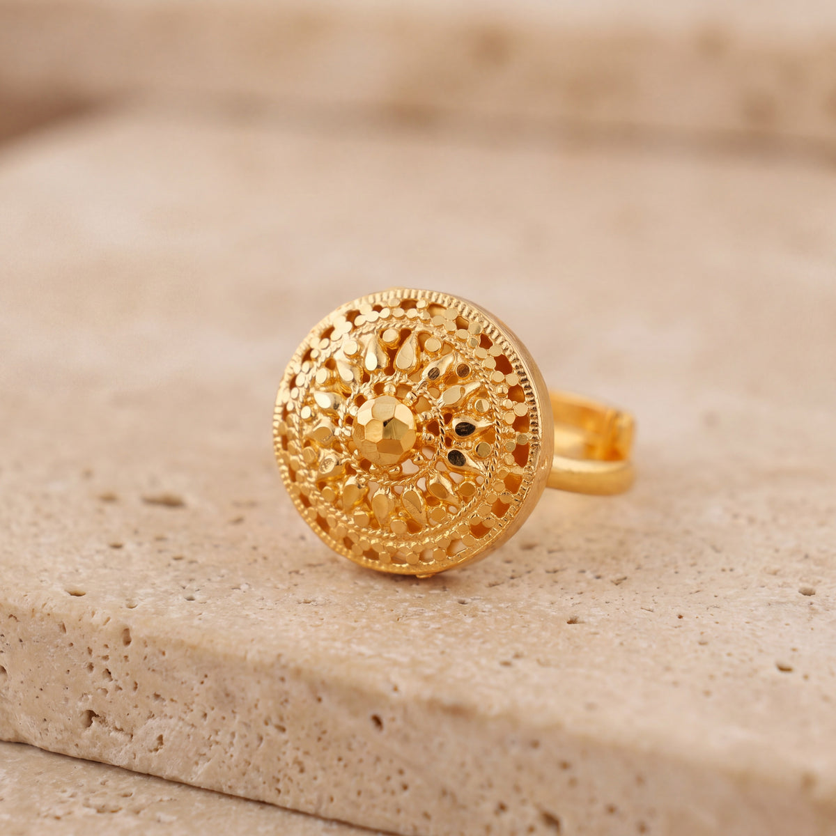Traditional Ring (154) on travertine