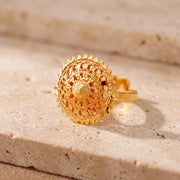 Traditional Ring (159) on travertine