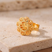 Traditional Ring (164) on travertine