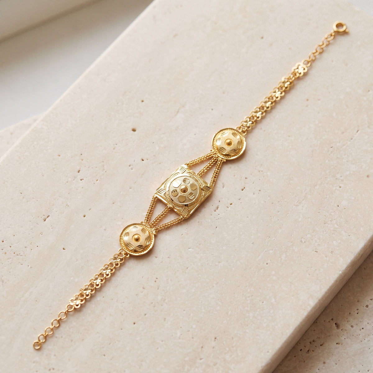 Traditional Stamp Bracelet (D11) on travertine
