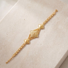 Traditional Stamp Bracelet (D12) on travertine