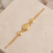 Traditional Stamp Bracelet (D2) on travertine