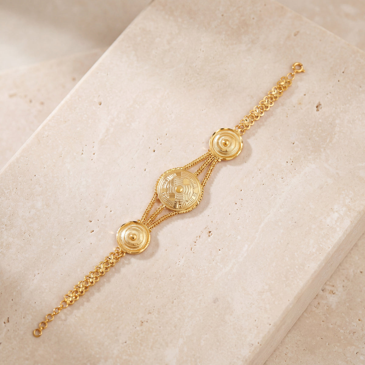 Traditional Stamp Bracelet (D3) on travertine