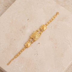 Traditional Stamp Bracelet (D4) on travertine