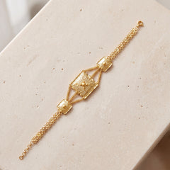 Traditional Stamp Bracelet (D7) on travertine