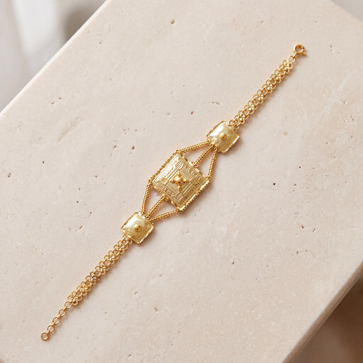Traditional Stamp Bracelet (D7) on travertine