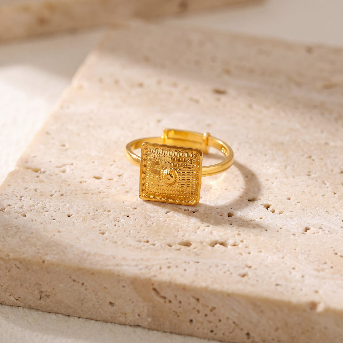 Traditional Stamp Ring (D1) on travertine