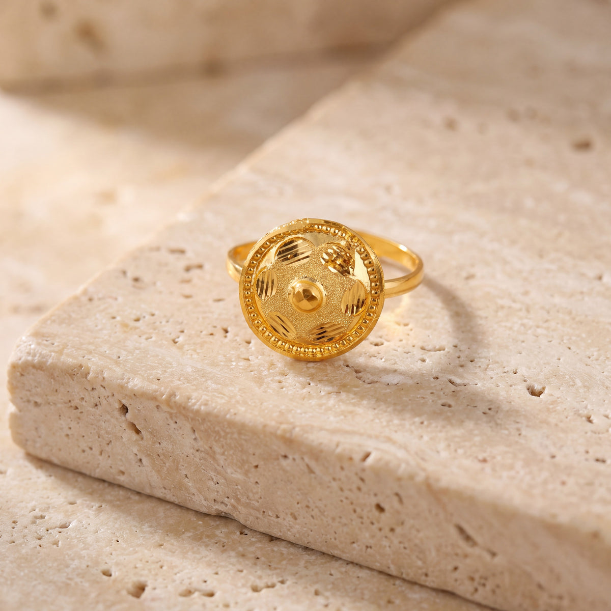 Traditional Stamp Ring (D7) on travertine