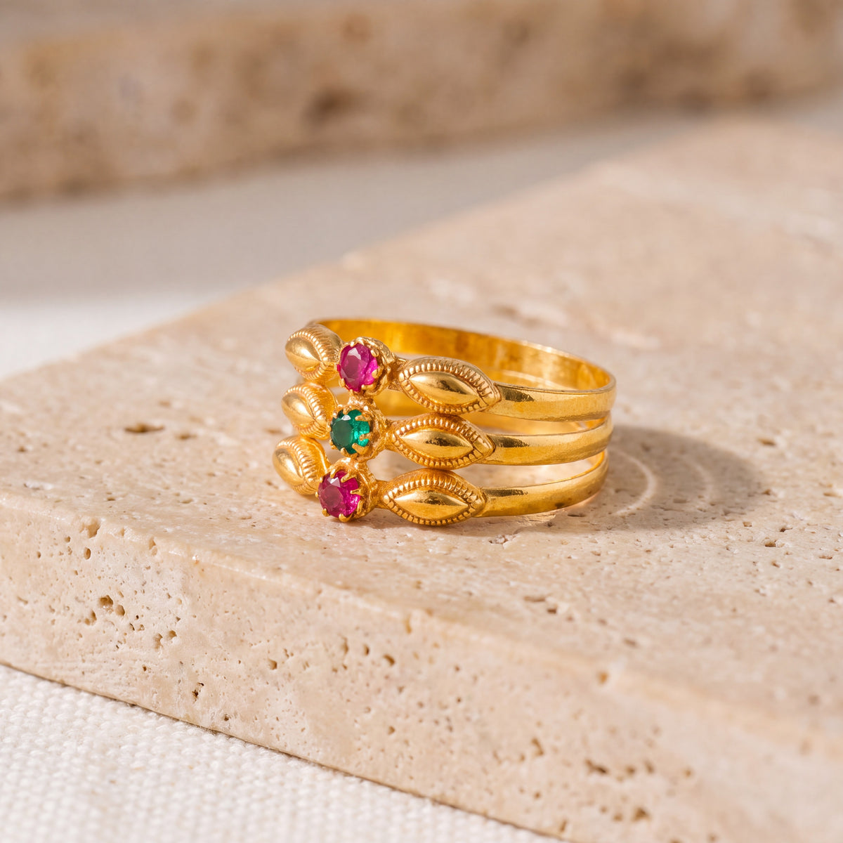 Triple Line Ring with stones (D1) on travertine