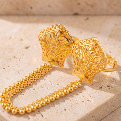 Twin Ring Chain (D19) on travertine