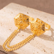 Twin Ring Chain (D21) on travertine