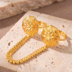 Twin Ring Chain (D25) on travertine