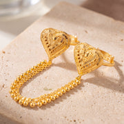 Twin Ring Chain (D33) on travertine