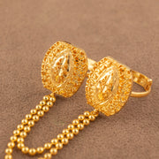 Twin Ring Chain (D35) in 925 silver with 24K gold plating, honeycomb granulated ring faces with a raised marquise centre