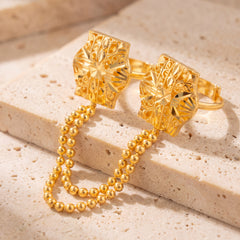 Twin Ring Chain (D38) on travertine
