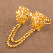 Twin Ring Chain (D38) in 925 silver with 24K gold plating, waisted square ring faces with a bold starburst cut